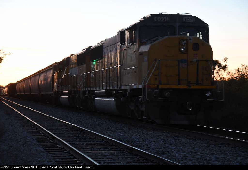 Tied down eastbound manifest waits in the siding